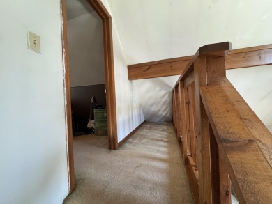 This charming 3-bedroom, 1-bath chalet-style home offers a on Birch Pointe Golf Club in Michigan - for sale on GolfHomes.com, golf home, golf lot