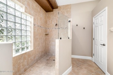 Beautifully remodeled 4BR/3BA home in the exclusive gated golf on The Club At Pelican Bay - North Course in Florida - for sale on GolfHomes.com, golf home, golf lot