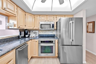 Experience maintenance-free living in this spacious 3-story on Pasadena Yacht and Country Club in Florida - for sale on GolfHomes.com, golf home, golf lot