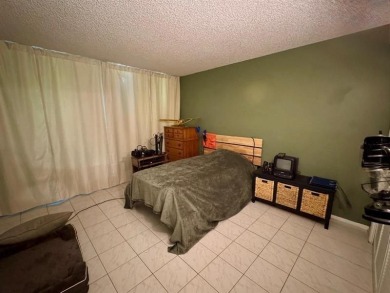 Exceptional opportunity to acquire a spacious 3-bedroom on Oaks Country Club in Florida - for sale on GolfHomes.com, golf home, golf lot