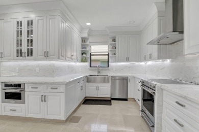 10099 Canoe Brook Circle on Boca Greens Country Club in Florida - for sale on GolfHomes.com, golf home, golf lot