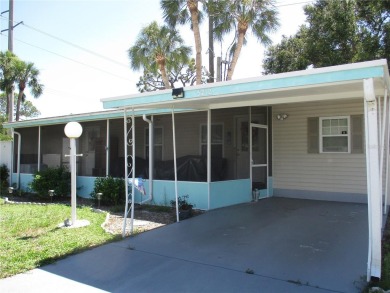 YOU'RE GONNA LOVE THIS *ADORABLE* SINGLE WIDE MOBILE HOME IN on Heather Hills Golf Course in Florida - for sale on GolfHomes.com, golf home, golf lot