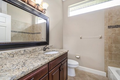 Beautifully remodeled 4BR/3BA home in the exclusive gated golf on The Club At Pelican Bay - North Course in Florida - for sale on GolfHomes.com, golf home, golf lot