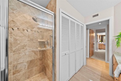 Experience maintenance-free living in this spacious 3-story on Pasadena Yacht and Country Club in Florida - for sale on GolfHomes.com, golf home, golf lot