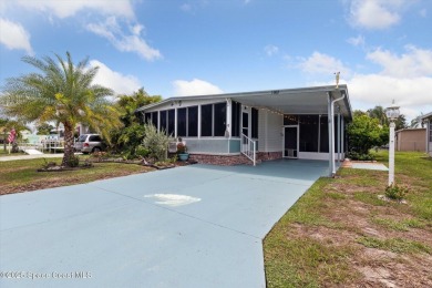 Welcome to Barefoot Bay! This 2 bedroom, 2 bath home is walking on Barefoot Bay Golf Course in Florida - for sale on GolfHomes.com, golf home, golf lot