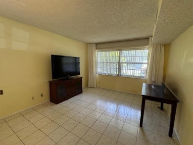 Exceptional opportunity to acquire a spacious 3-bedroom on Oaks Country Club in Florida - for sale on GolfHomes.com, golf home, golf lot