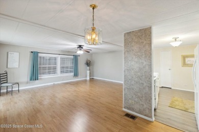 Welcome to Barefoot Bay! This 2 bedroom, 2 bath home is walking on Barefoot Bay Golf Course in Florida - for sale on GolfHomes.com, golf home, golf lot