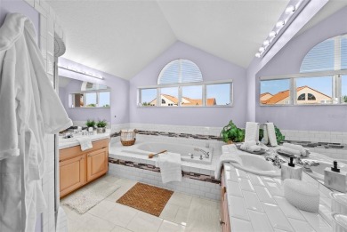 Experience maintenance-free living in this spacious 3-story on Pasadena Yacht and Country Club in Florida - for sale on GolfHomes.com, golf home, golf lot
