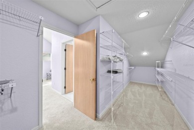 Experience maintenance-free living in this spacious 3-story on Pasadena Yacht and Country Club in Florida - for sale on GolfHomes.com, golf home, golf lot