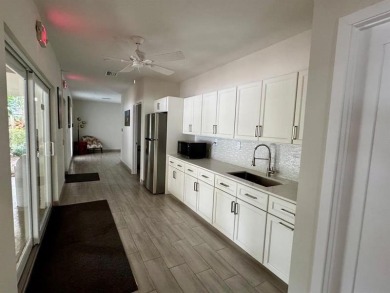 Exceptional opportunity to acquire a spacious 3-bedroom on Oaks Country Club in Florida - for sale on GolfHomes.com, golf home, golf lot