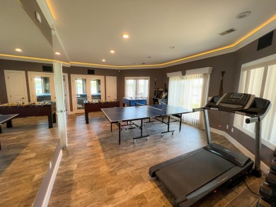 Discover unparalleled luxury on this exclusive private island on Battle Creek Country Club in Michigan - for sale on GolfHomes.com, golf home, golf lot