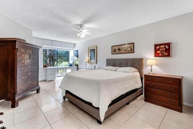 Beautifully maintained home in the gated Boca Woods Country on Boca Woods Country Club in Florida - for sale on GolfHomes.com, golf home, golf lot