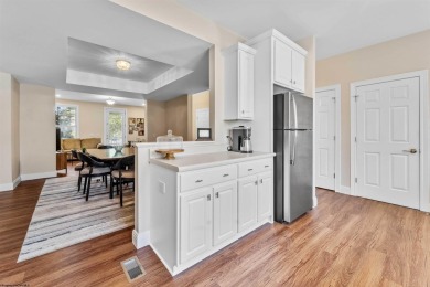 This bright, updated unit features new LVP flooring and a porch on Lakeview Golf Resort and Spa - Lakeview in West Virginia - for sale on GolfHomes.com, golf home, golf lot