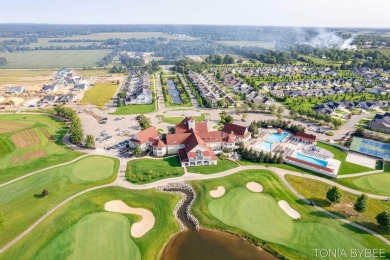 Location, location, location! This wonderful home is located in on The Macatwa Legends Golf Course in Michigan - for sale on GolfHomes.com, golf home, golf lot