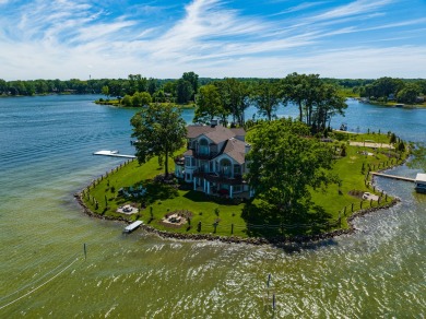 Discover unparalleled luxury on this exclusive private island on Battle Creek Country Club in Michigan - for sale on GolfHomes.com, golf home, golf lot