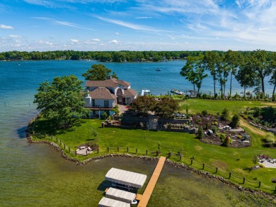 Discover unparalleled luxury on this exclusive private island on Battle Creek Country Club in Michigan - for sale on GolfHomes.com, golf home, golf lot