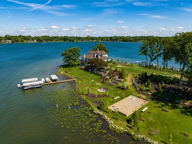 Discover unparalleled luxury on this exclusive private island on Battle Creek Country Club in Michigan - for sale on GolfHomes.com, golf home, golf lot