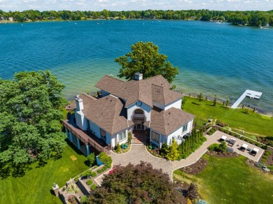 Discover unparalleled luxury on this exclusive private island on Battle Creek Country Club in Michigan - for sale on GolfHomes.com, golf home, golf lot