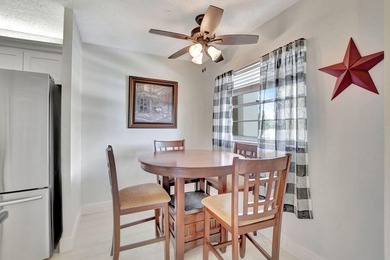 Enjoy peaceful, open views from this spacious 1,300 sq ft on Boca Dunes Golf and Country Club in Florida - for sale on GolfHomes.com, golf home, golf lot