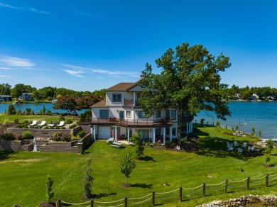 Discover unparalleled luxury on this exclusive private island on Battle Creek Country Club in Michigan - for sale on GolfHomes.com, golf home, golf lot