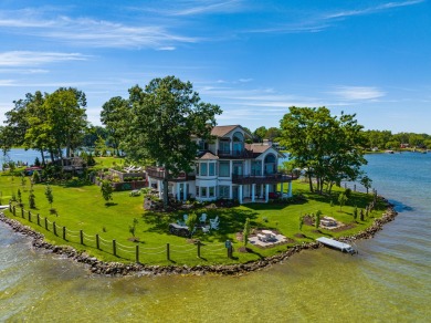 Discover unparalleled luxury on this exclusive private island on Battle Creek Country Club in Michigan - for sale on GolfHomes.com, golf home, golf lot