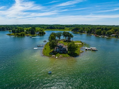 Discover unparalleled luxury on this exclusive private island on Battle Creek Country Club in Michigan - for sale on GolfHomes.com, golf home, golf lot