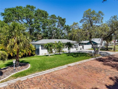 Turnkey Dunedin Triplex - Located in the beloved Dunedin Golf on The Dunedin Country Club in Florida - for sale on GolfHomes.com, golf home, golf lot