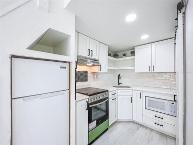 Turnkey Dunedin Triplex - Located in the beloved Dunedin Golf on The Dunedin Country Club in Florida - for sale on GolfHomes.com, golf home, golf lot