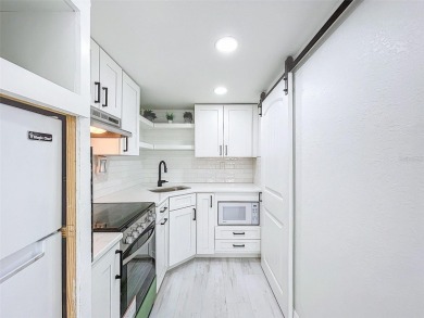 Turnkey Dunedin Triplex - Located in the beloved Dunedin Golf on The Dunedin Country Club in Florida - for sale on GolfHomes.com, golf home, golf lot