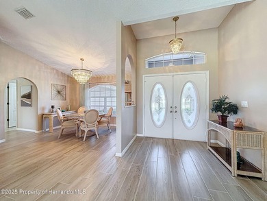 Move in ready, modern home with. 3 bedrooms, 2 full baths + 2 on Glen Lakes Country Club in Florida - for sale on GolfHomes.com, golf home, golf lot