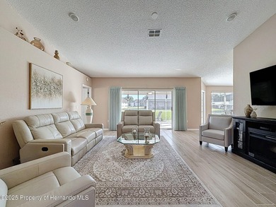 Move in ready, modern home with. 3 bedrooms, 2 full baths + 2 on Glen Lakes Country Club in Florida - for sale on GolfHomes.com, golf home, golf lot