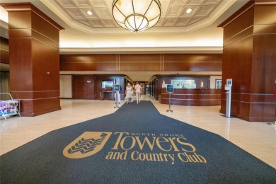 Huge living room with formal dining room. White gourmet eat in on Towers Country Club in New York - for sale on GolfHomes.com, golf home, golf lot