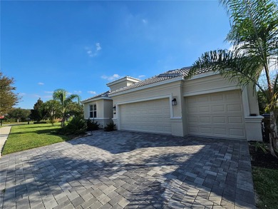 Built in 2024, this 4 bedroom / 3 bathroom Newcastle model on The Oasis Club at Champions Gate in Florida - for sale on GolfHomes.com, golf home, golf lot