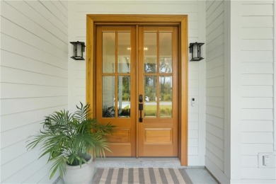 Experience Coastal Georgia Living in the luxurious Riverfront on The Golf Club At Sanctuary Cove in Georgia - for sale on GolfHomes.com, golf home, golf lot