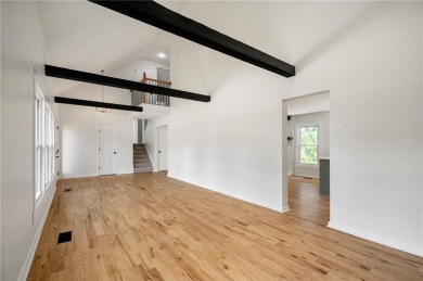 Looking for a better-than-brand-new home? This fully remodeled on National Golf Club of Kansas City in Missouri - for sale on GolfHomes.com, golf home, golf lot
