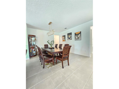 Built in 2024, this 4 bedroom / 3 bathroom Newcastle model on The Oasis Club at Champions Gate in Florida - for sale on GolfHomes.com, golf home, golf lot