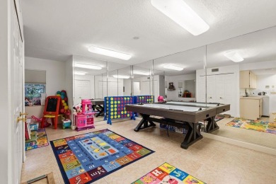 Tucked within the gates of Isleworth Golf Community and Country on Isleworth Golf and Country Club in Florida - for sale on GolfHomes.com, golf home, golf lot