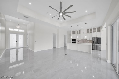 Introducing a newly constructed masterpiece on an expansive on Del Tura Golf and Country Club in Florida - for sale on GolfHomes.com, golf home, golf lot