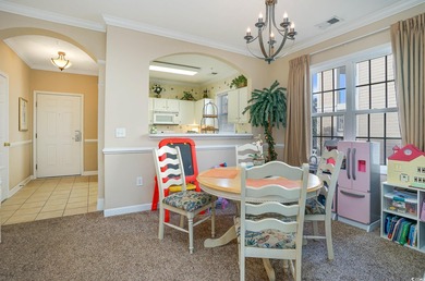 Two-bedroom two bath fully furnished second floor end unit in on Barefoot Resort and Golf Club  in South Carolina - for sale on GolfHomes.com, golf home, golf lot