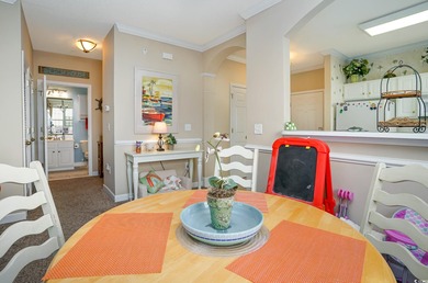 Two-bedroom two bath fully furnished second floor end unit in on Barefoot Resort and Golf Club  in South Carolina - for sale on GolfHomes.com, golf home, golf lot