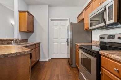 Looking for a first-floor condo with an attached garage that on Stone Creek Golf Club in Illinois - for sale on GolfHomes.com, golf home, golf lot