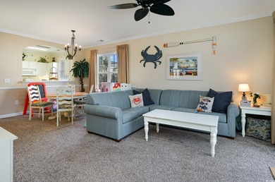 Two-bedroom two bath fully furnished second floor end unit in on Barefoot Resort and Golf Club  in South Carolina - for sale on GolfHomes.com, golf home, golf lot