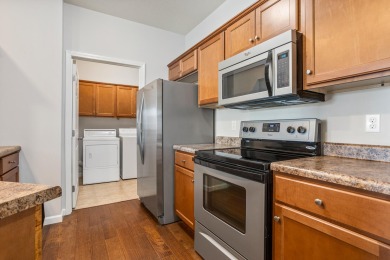 Looking for a first-floor condo with an attached garage that on Stone Creek Golf Club in Illinois - for sale on GolfHomes.com, golf home, golf lot