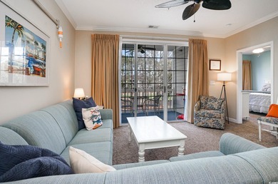 Two-bedroom two bath fully furnished second floor end unit in on Barefoot Resort and Golf Club  in South Carolina - for sale on GolfHomes.com, golf home, golf lot