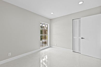 Beautifully updated 3BR/2BA, 1,716 sq ft home on a private on Boca Greens Country Club in Florida - for sale on GolfHomes.com, golf home, golf lot