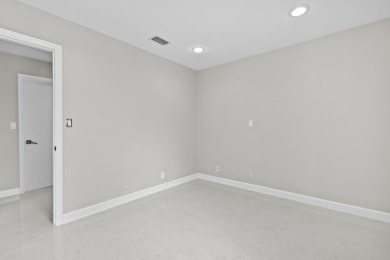 Beautifully updated 3BR/2BA, 1,716 sq ft home on a private on Boca Greens Country Club in Florida - for sale on GolfHomes.com, golf home, golf lot