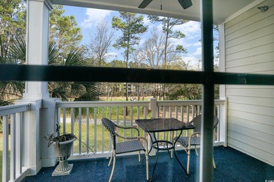 Two-bedroom two bath fully furnished second floor end unit in on Barefoot Resort and Golf Club  in South Carolina - for sale on GolfHomes.com, golf home, golf lot