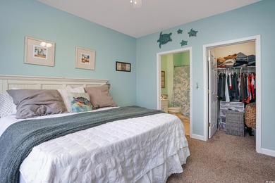 Two-bedroom two bath fully furnished second floor end unit in on Barefoot Resort and Golf Club  in South Carolina - for sale on GolfHomes.com, golf home, golf lot