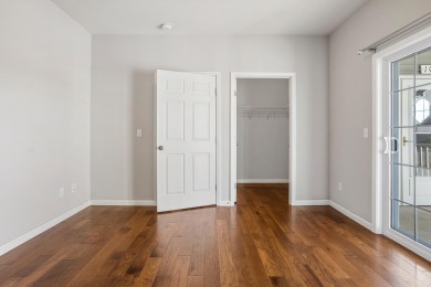 Looking for a first-floor condo with an attached garage that on Stone Creek Golf Club in Illinois - for sale on GolfHomes.com, golf home, golf lot