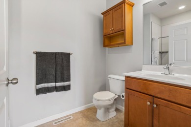 Looking for a first-floor condo with an attached garage that on Stone Creek Golf Club in Illinois - for sale on GolfHomes.com, golf home, golf lot